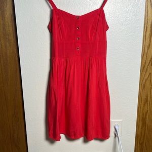Red spaghetti strap mini dress with pockets